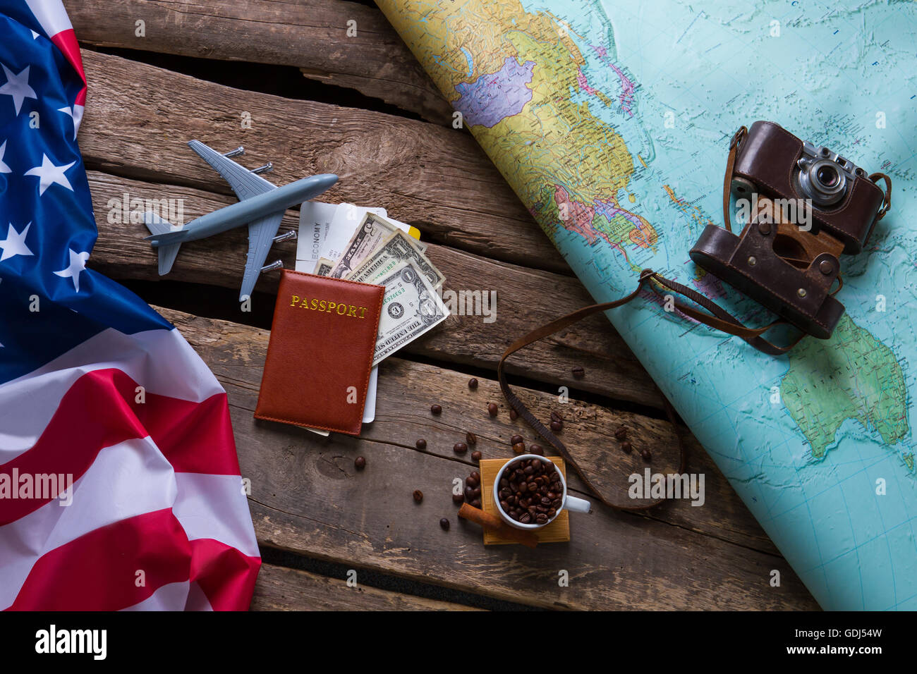 Brown passport and US flag Stock Photo Alamy
