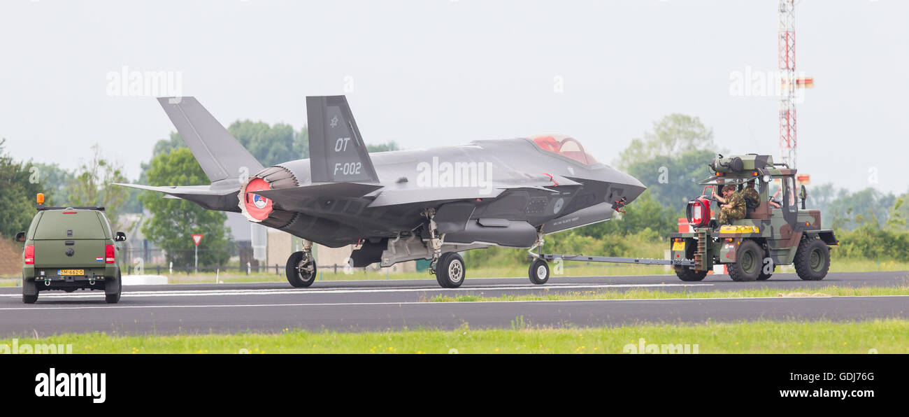LEEUWARDEN, NETHERLANDS - JUNE 11 2016: F35 Joint Strike Fighter is towed to the hangar after a demonstration flight at the Dutc Stock Photo
