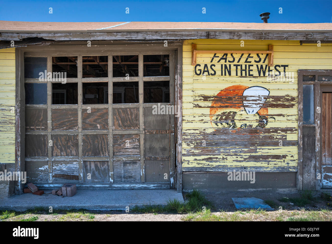 Old mural at abandoned gas station in historic silver mining town of Pioche, Great Basin, Nevada, USA Stock Photo