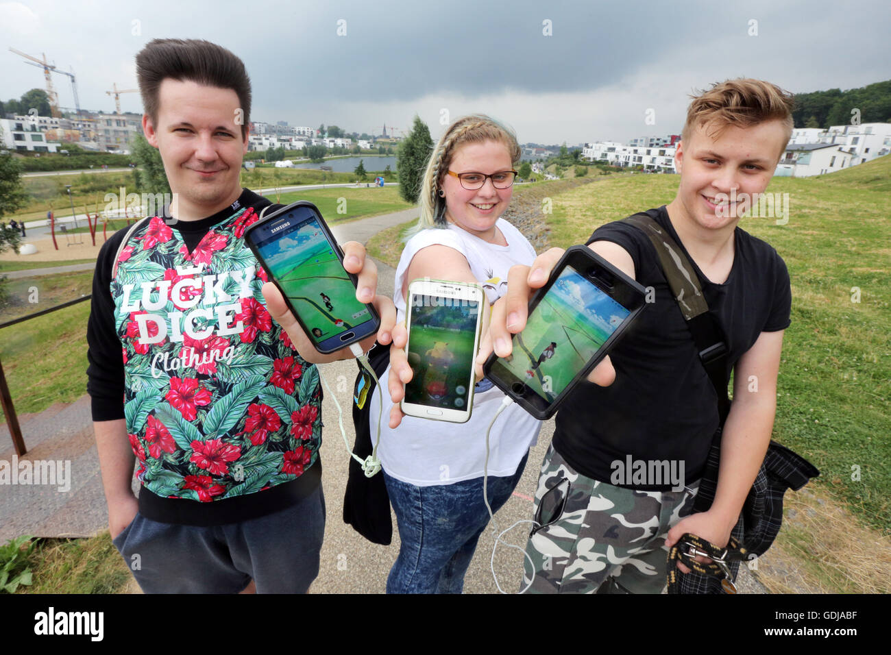 Pokemon Go Young People Play The New Nintendo Game Pokemon Go On Their Smartphones On Lake Phoenix In Dortmund Germany The Players Try To Catch In The Real World Virtual Pokemon Monsters Pokemon Go Young People Play The New Nintendo Game Pokemon Go On Their Smartphones On Lake Phoenix In Dortmund Germany The Players Try To Catch In The Real World Virtual Pokemon Monsters