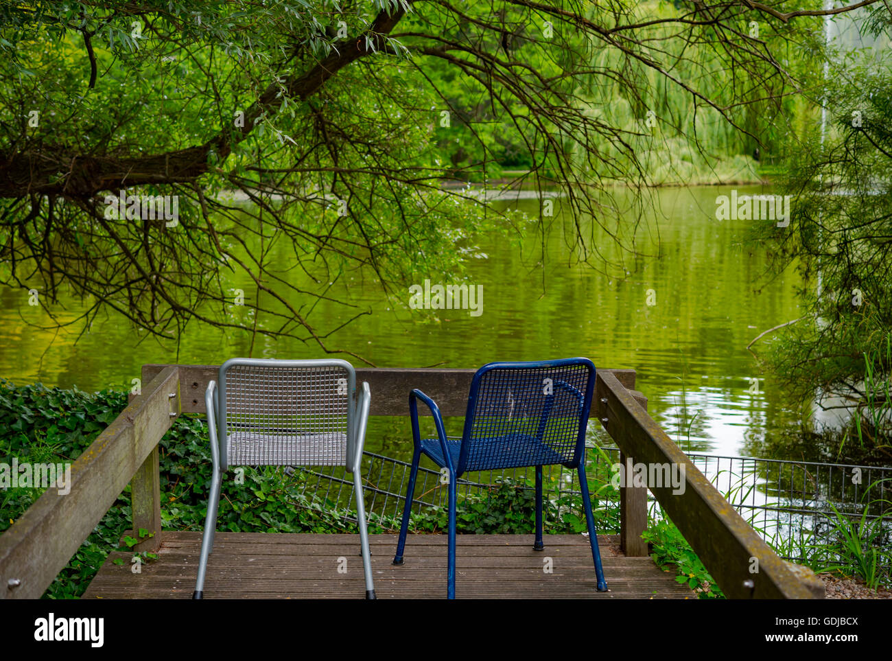 Two wooden chairs lake hi-res stock photography and images - Alamy
