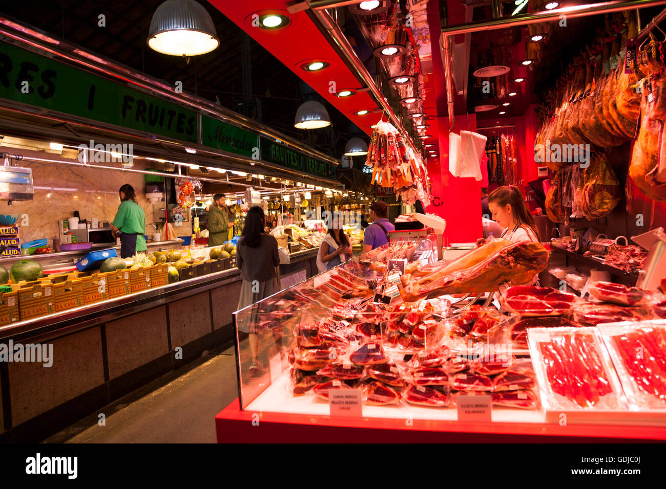 Iberian ham stall at La Boqueria Market in Barcelona, Spain Stock Photo