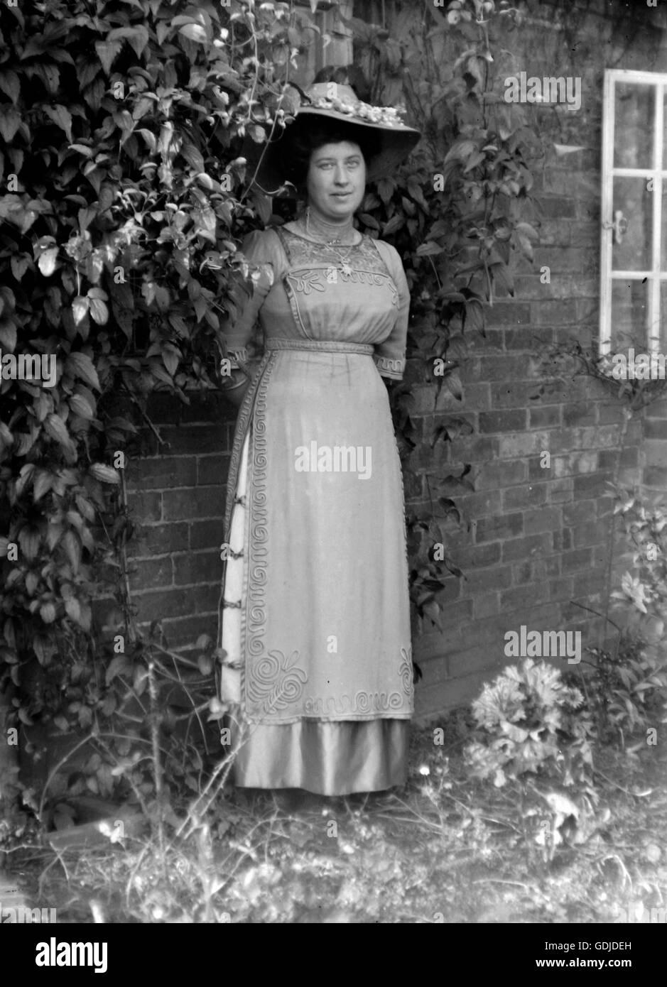 Woman in fashion dress design c 1900 Photograph by Tony Henshaw Stock Photo