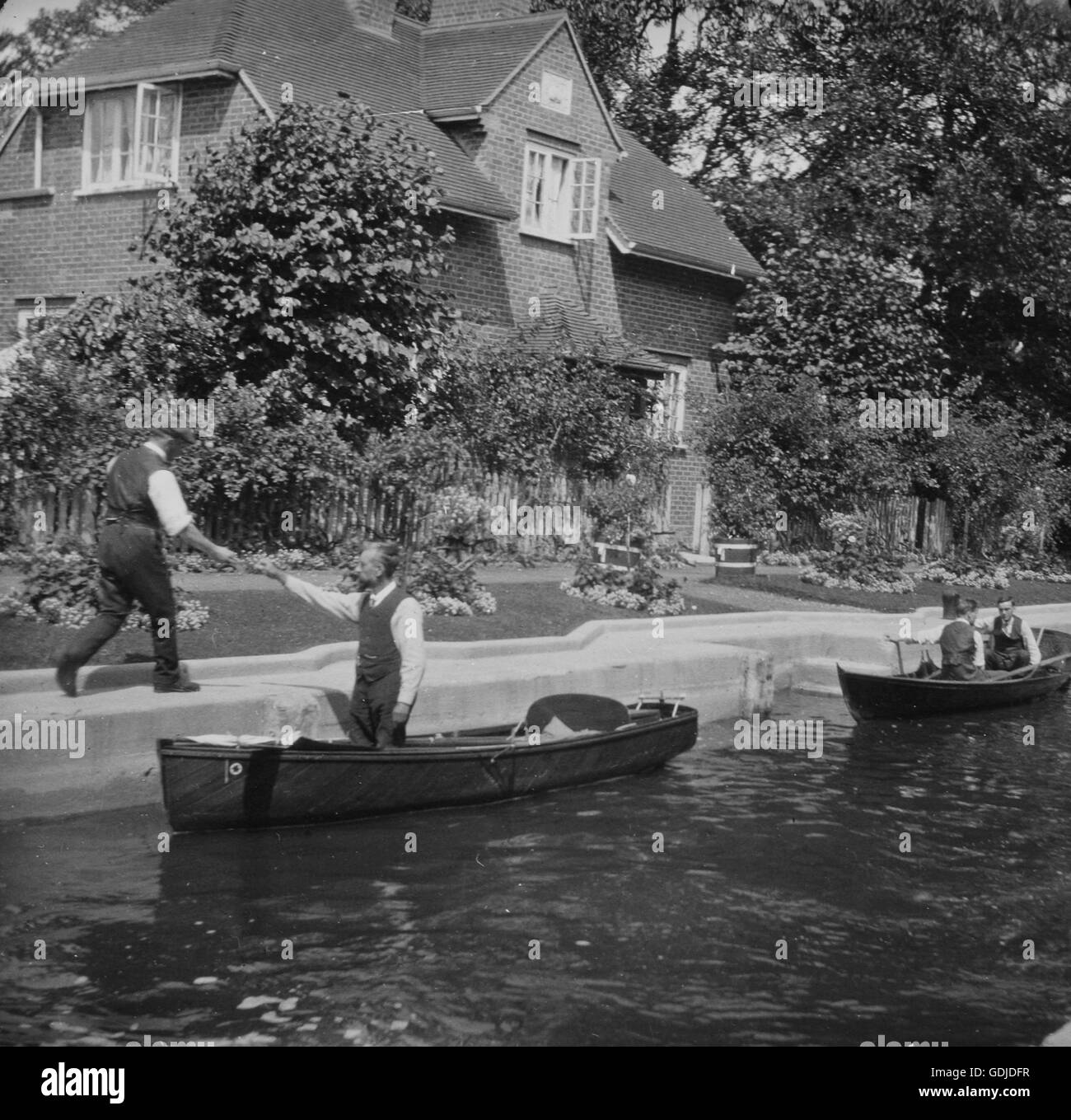 Rowing or punting on the River Thames by photographer E. A Crouch of South Essex Camera Club c1912 Photograph by Tony Henshaw Stock Photo
