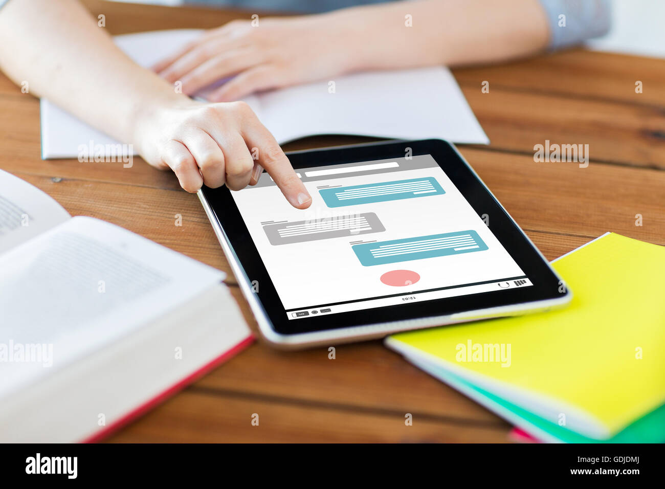close up of student with tablet pc and notebook Stock Photo - Alamy