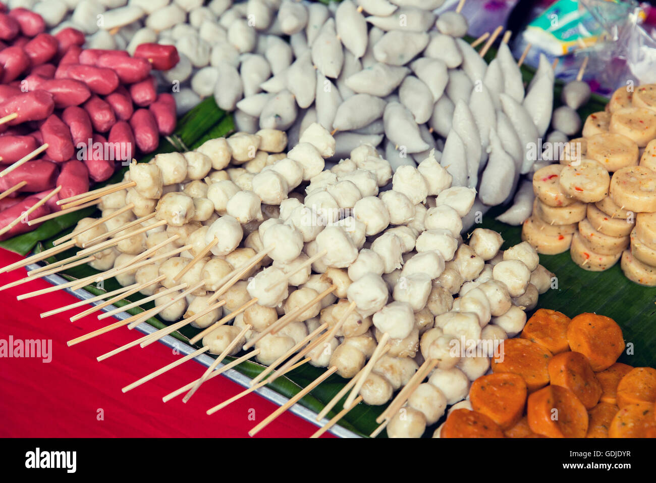 different snacks at street market Stock Photo - Alamy