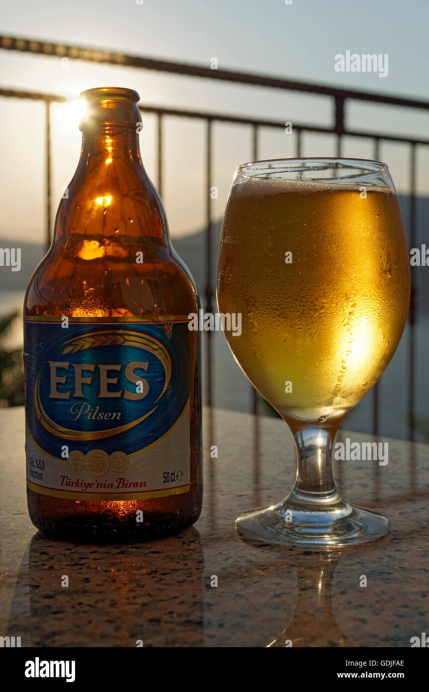 Bottle and glass of Efes Pilsen beer, Turkey. Stock Photo