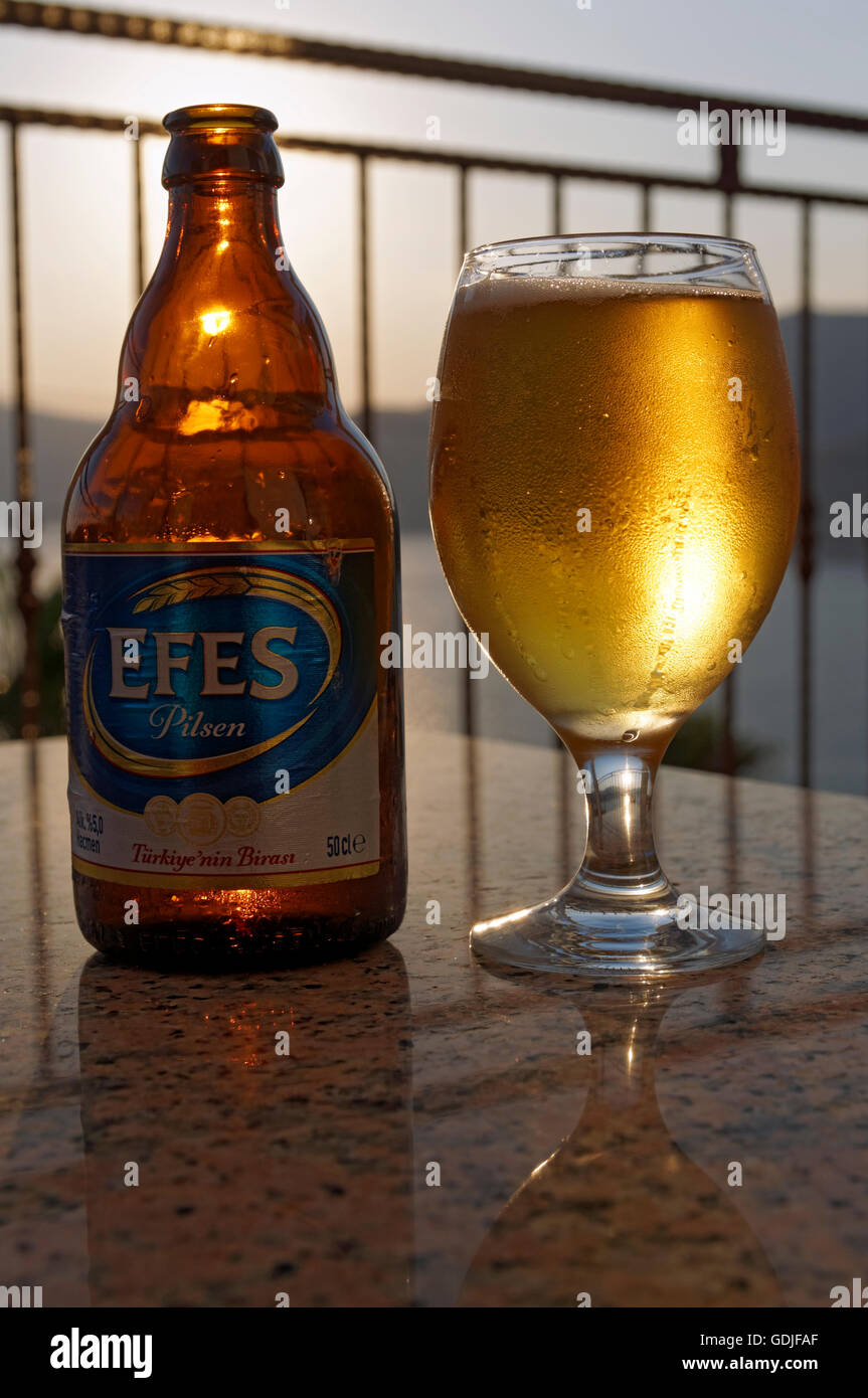 Bottle and glass of Efes Pilsen beer, Turkey. Stock Photo