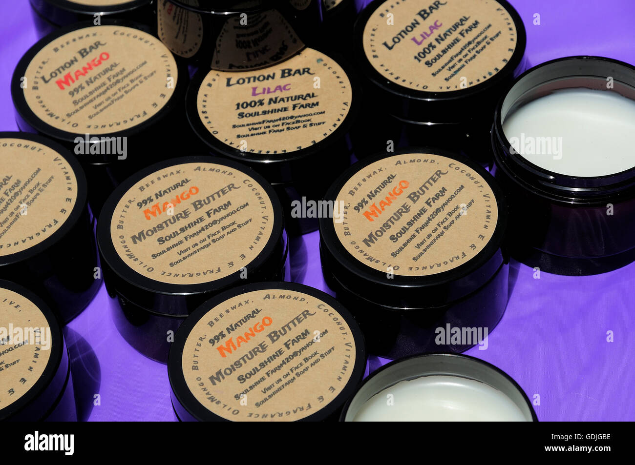 Homemade moisture butter lotions on sale at local art festival. Stock Photo
