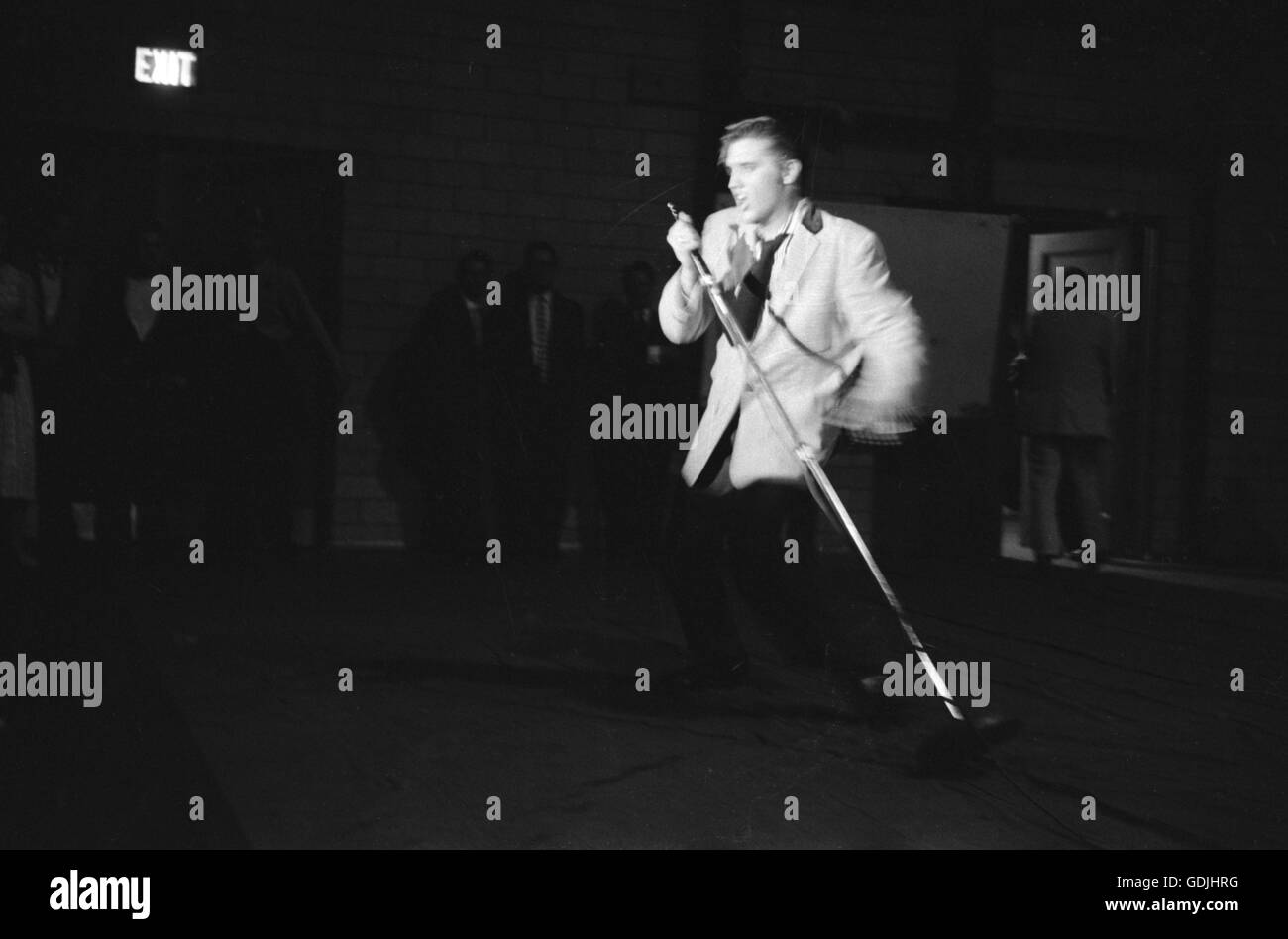 Elvis Presley during a performance at the University of Dayton Fieldhouse, May 27, 1956. Stock Photo