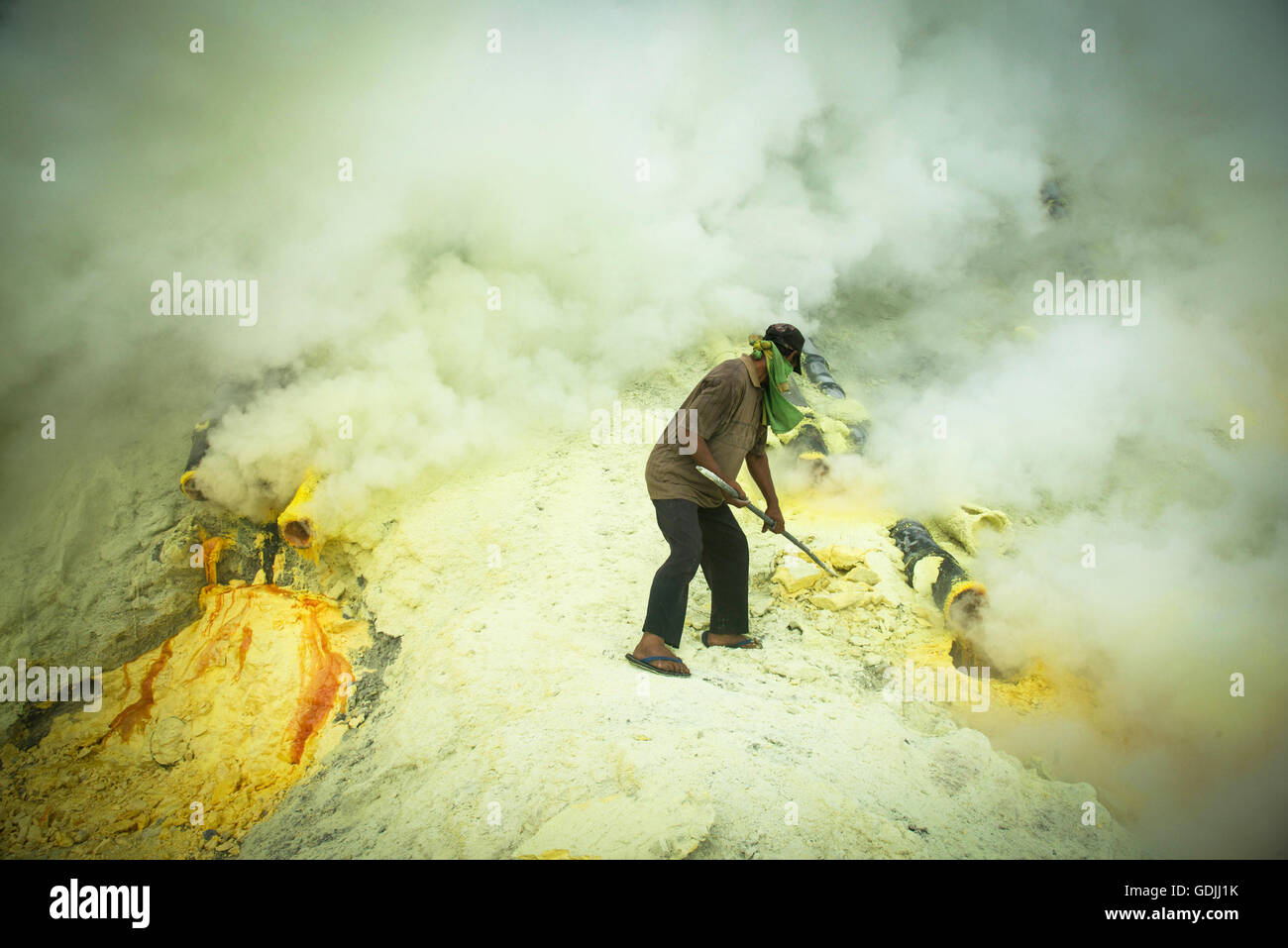 A worker at Kawah Ijen volcano sulphur mine, Java, Indonesia Stock Photo