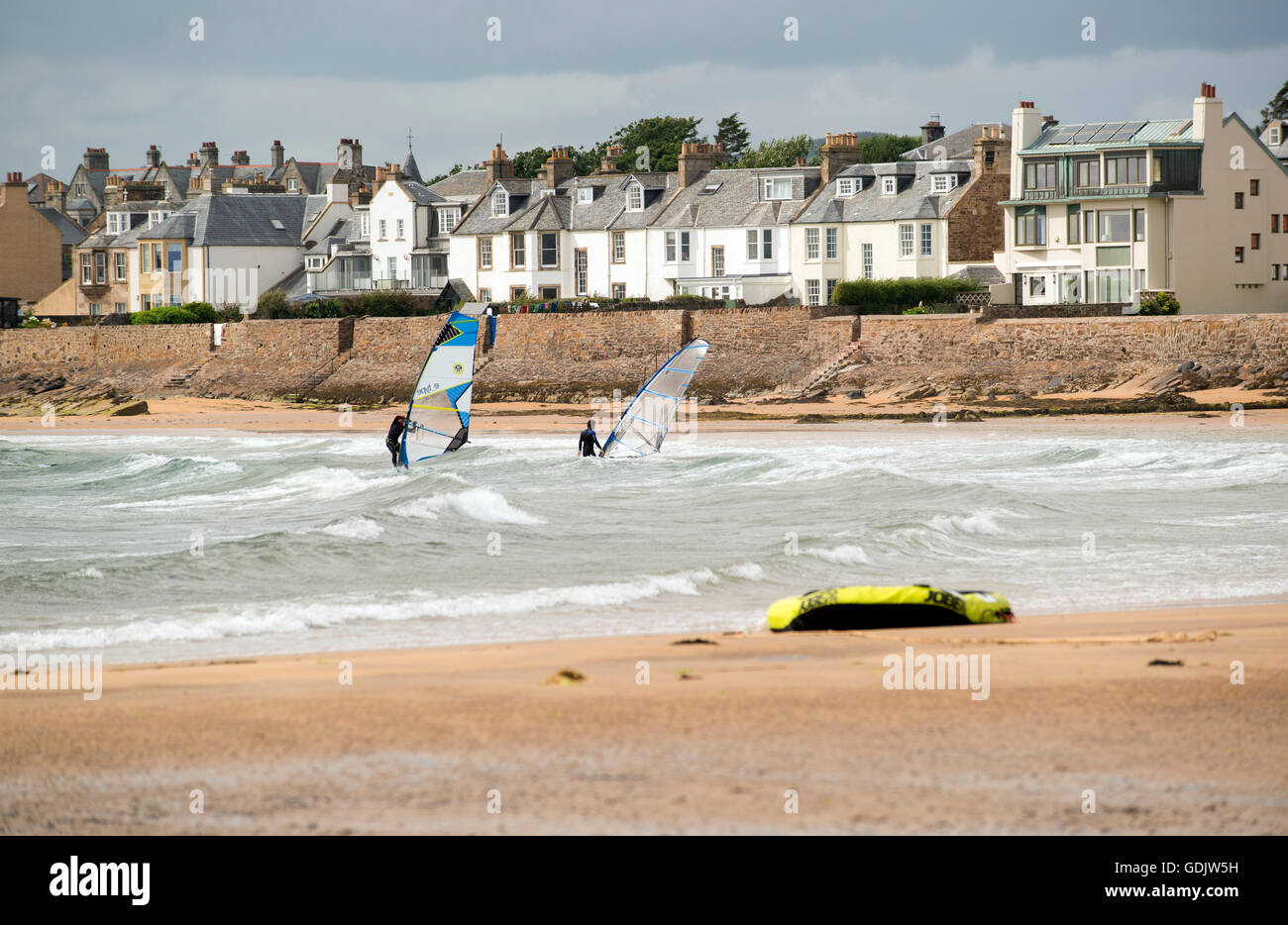 Wind surfers at Earlsferry beach in Elie, Fife, Scotland. Stock Photo