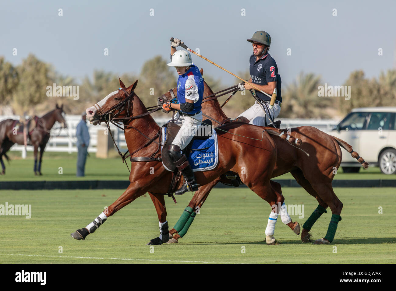 Horsemen riding during the Abu Dhabi Polo Cup event, Abu Dhabi, UAE. Stock Photo