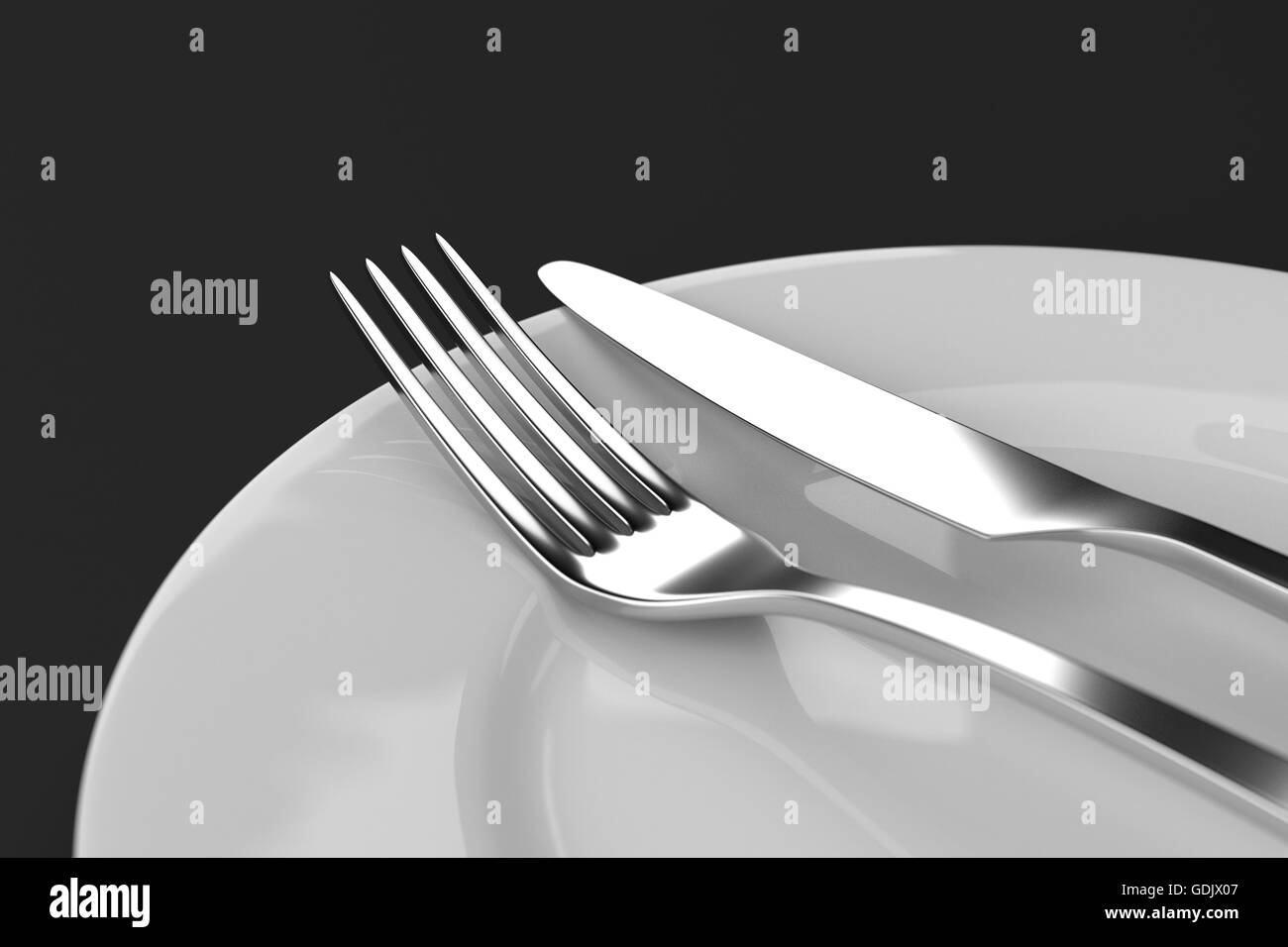 Fork and knife with plates. Serving table. Two empty plates ready for ...