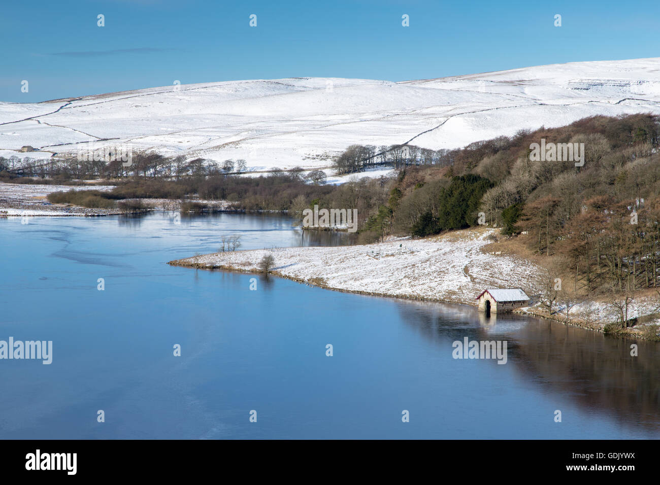 View looking down on to boat house on icebound Malham Tarn, Yorkshire Dales, England, UK Stock Photo
