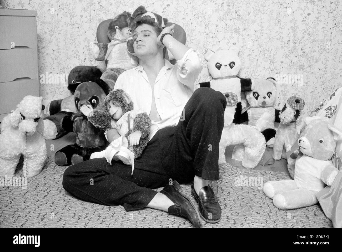 Elvis Presley at home, with teddy bears Stock Photo