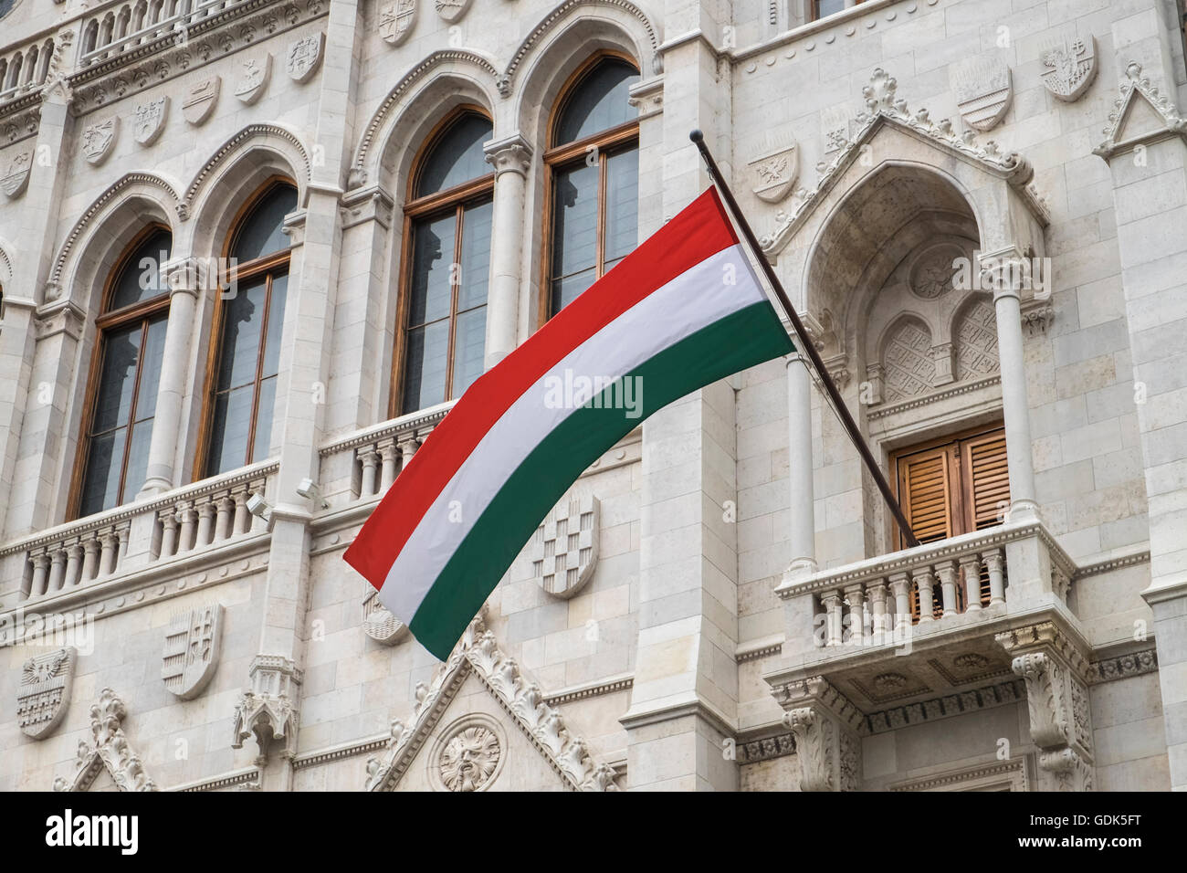 Hungarian flag outside Parliament building, Budapest, Hungary Stock Photo