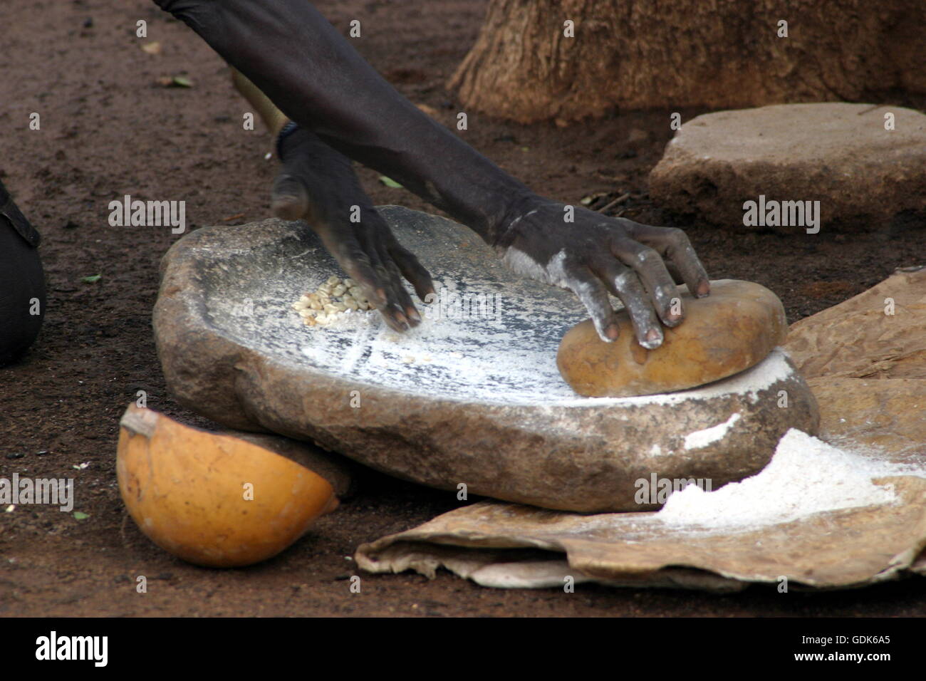 Grinding of maize, South Sudan Stock Photo