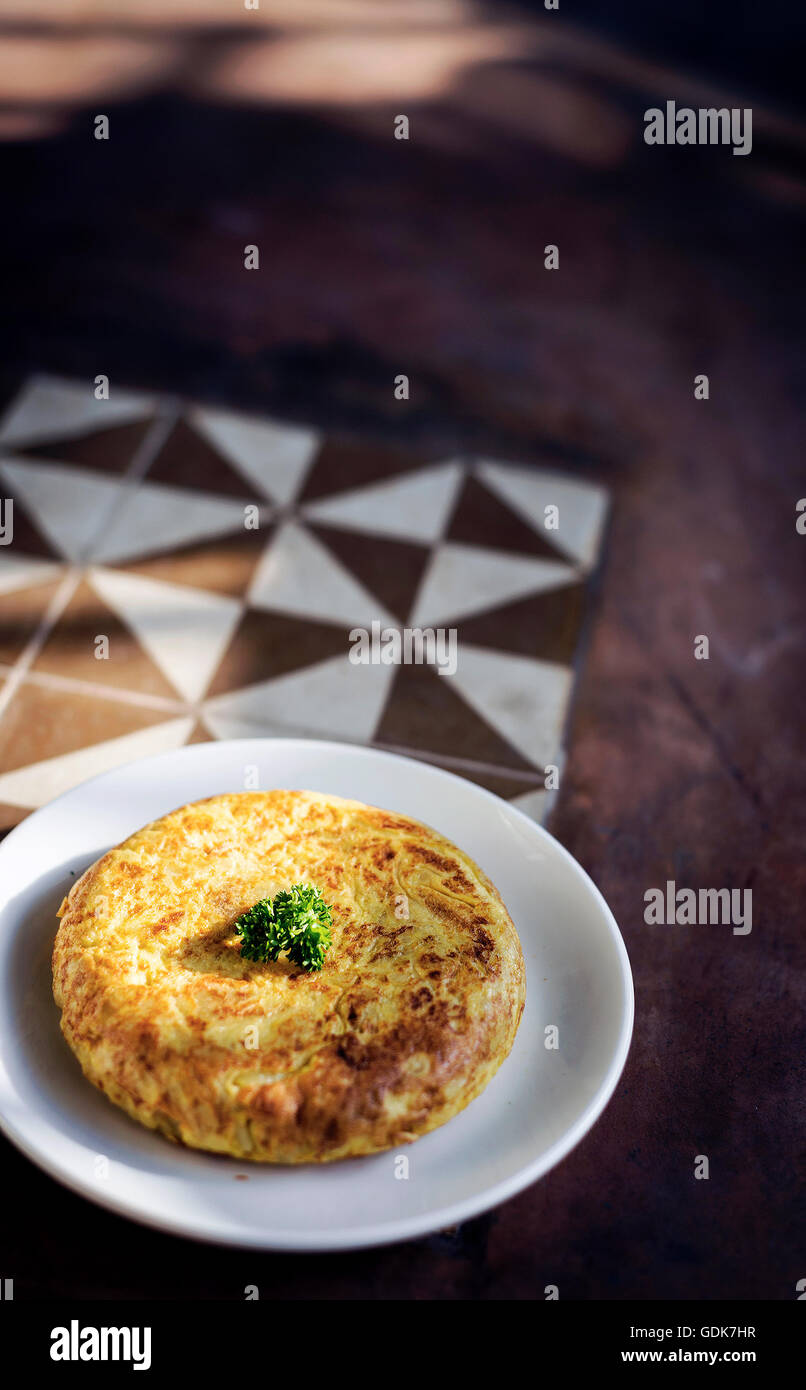 spanish tortilla egg omelette traditional tapas snack rustic style food Stock Photo
