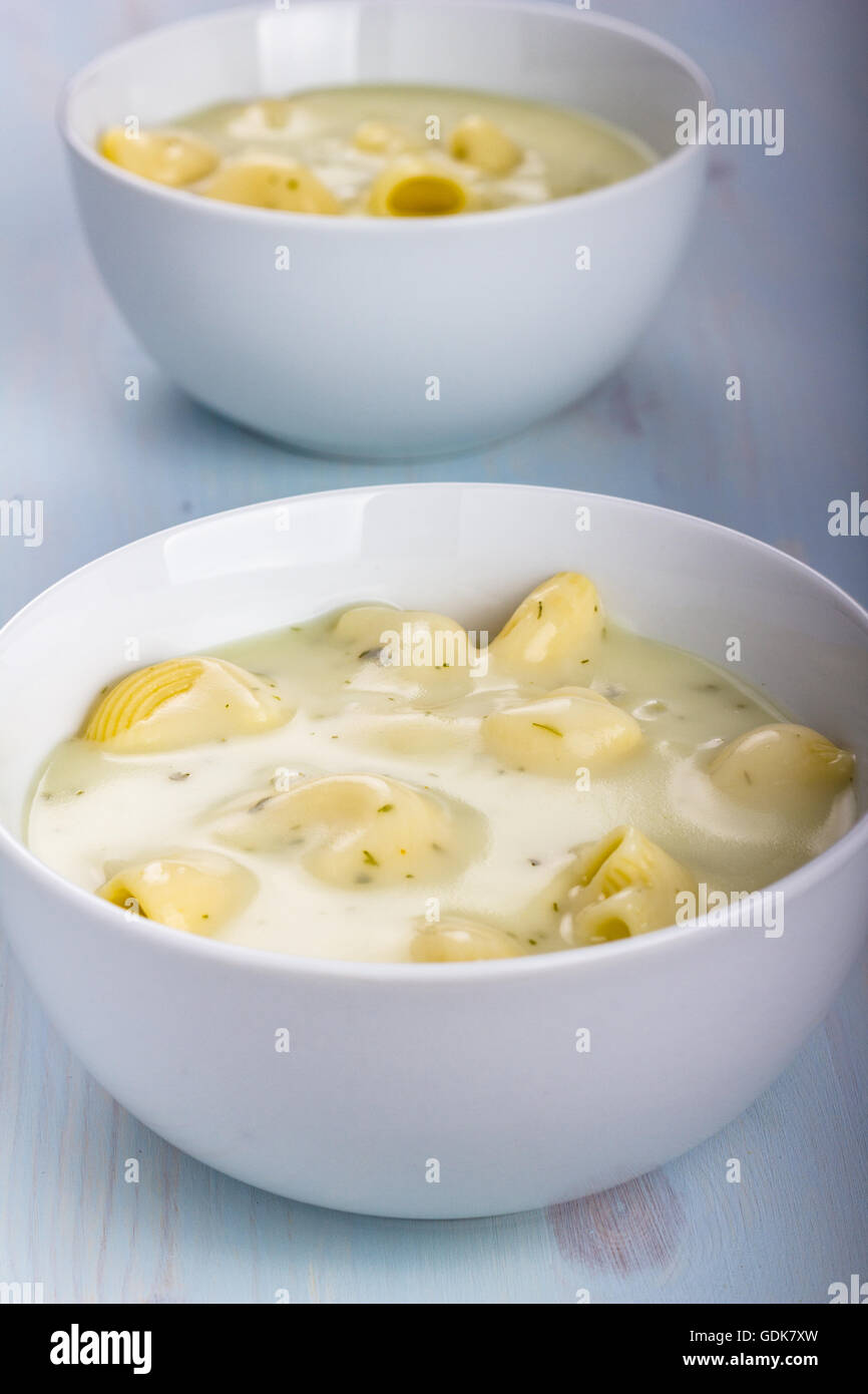 Thick and creamy chicken soup with noodles Stock Photo - Alamy