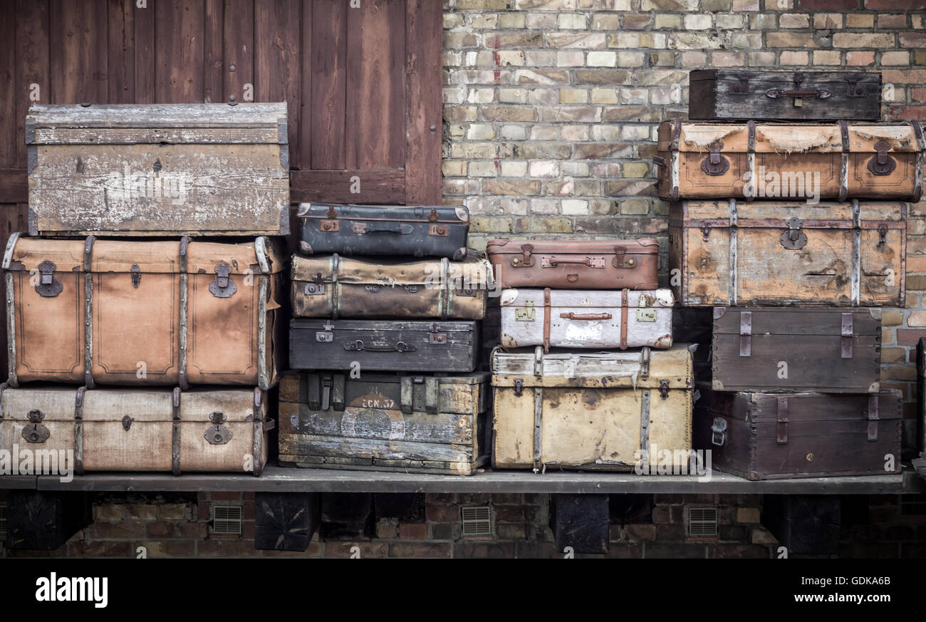 Vintage leather suitcases stacked vertically Spreewald, Germany Stock