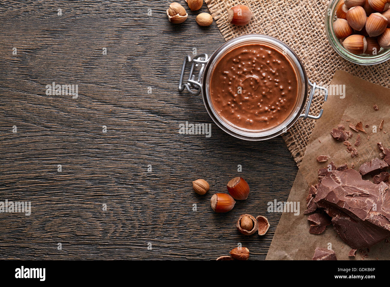 Background with hazelnut spread and ingredients Stock Photo Alamy