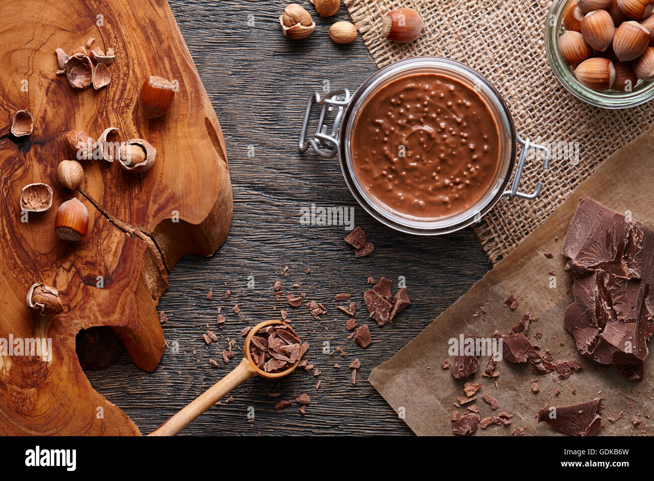 Hazelnut spread and ingredients on dark background Stock Photo Alamy
