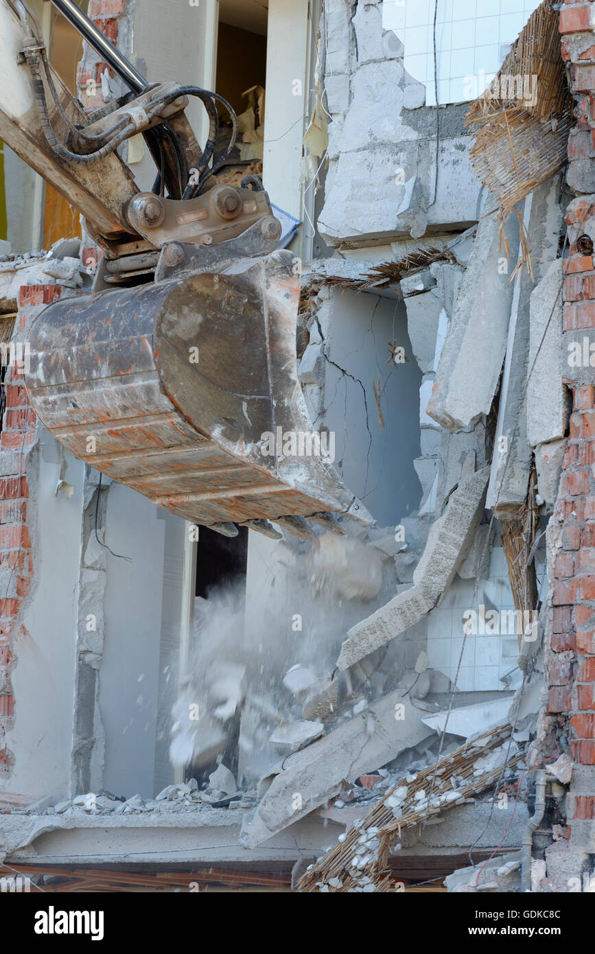 Excavator shovel tearing a wall down, demolition of a building, Bad Heilbrunn, Upper Bavaria, Bavaria, Germany Stock Photo