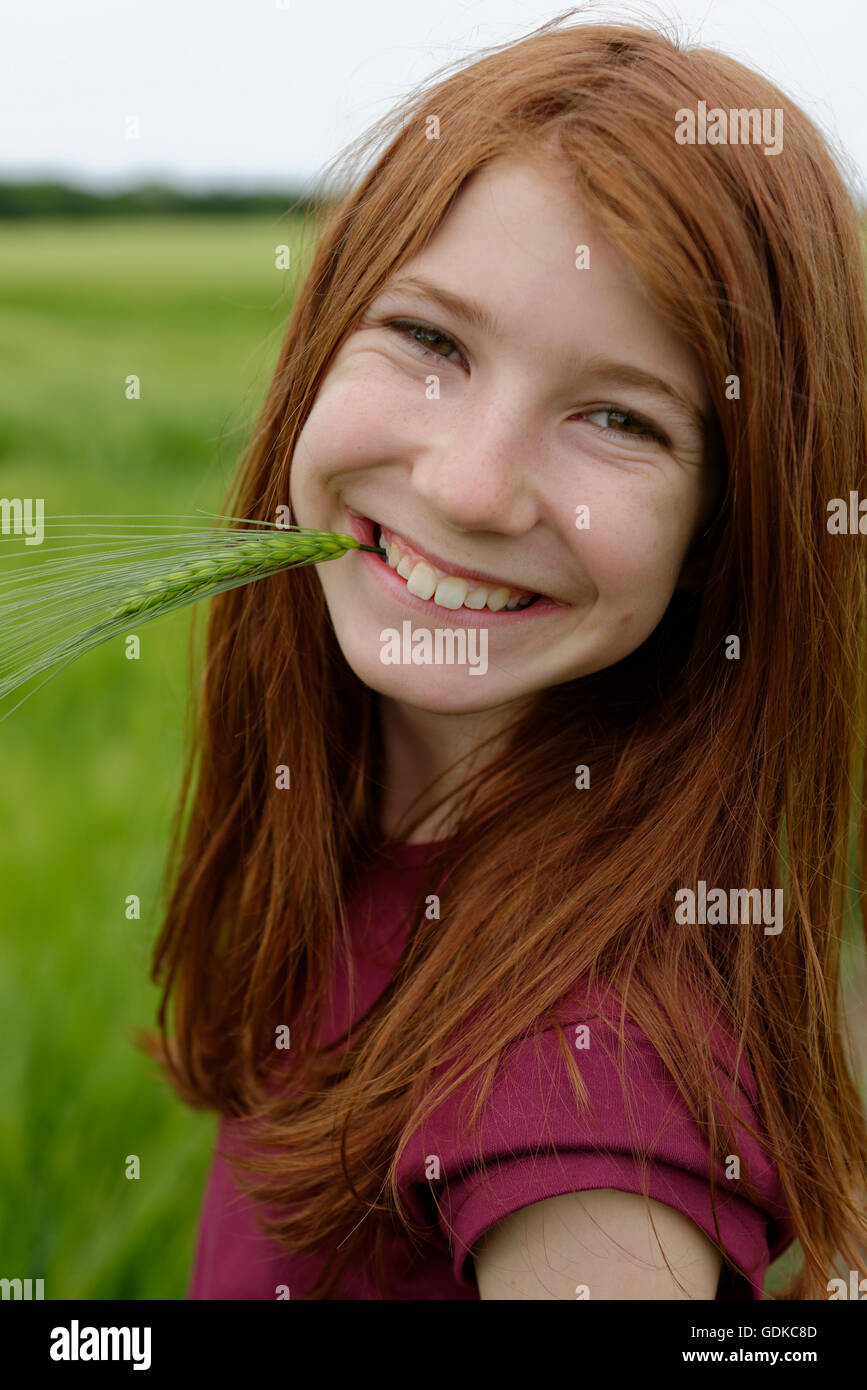Smiling teenage girl, laughing, with barley grass in her ... Smiling teenage girl, laughing, with barley grass in her ... on Small:zikqrscfop8= Teenage Girls
id=19567