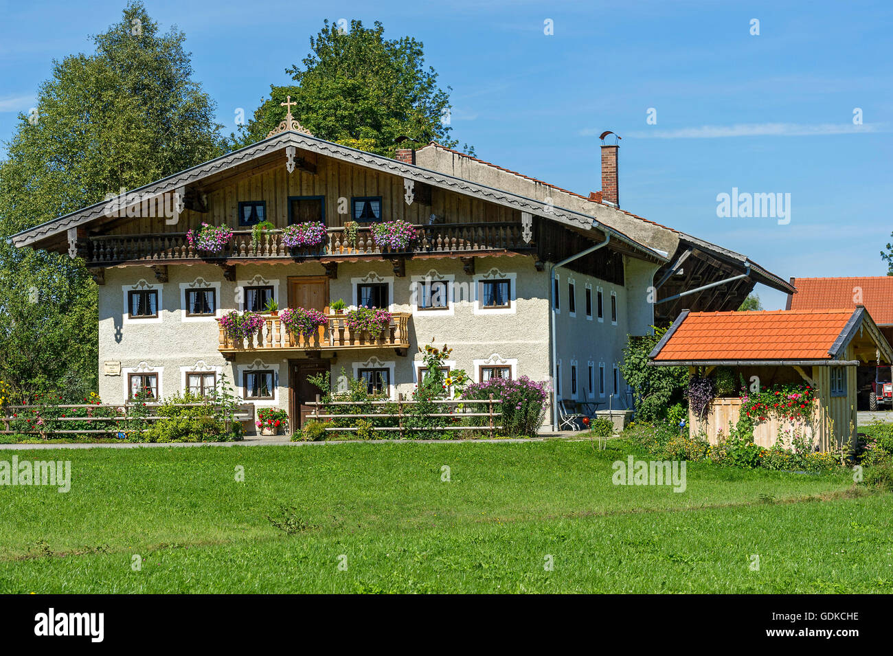 Old farmhouse with floral decoration, Fischbachau, Upper Bavaria, Bavaria, Germany Stock Photo
