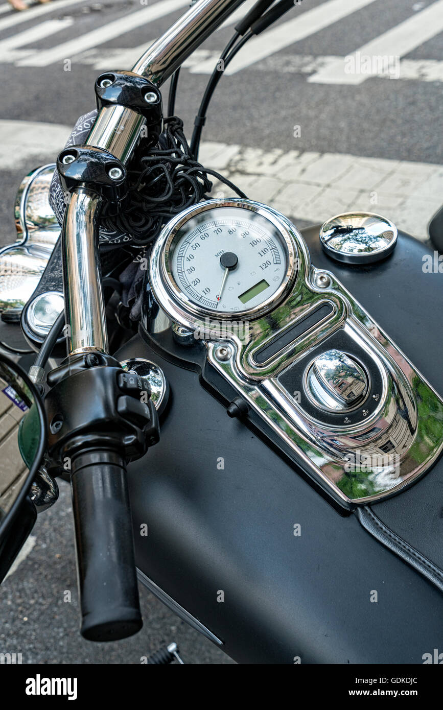 Close up of a Motorcycle Handle Bars and Control Panel, Parked on a New York City Street Stock Photo