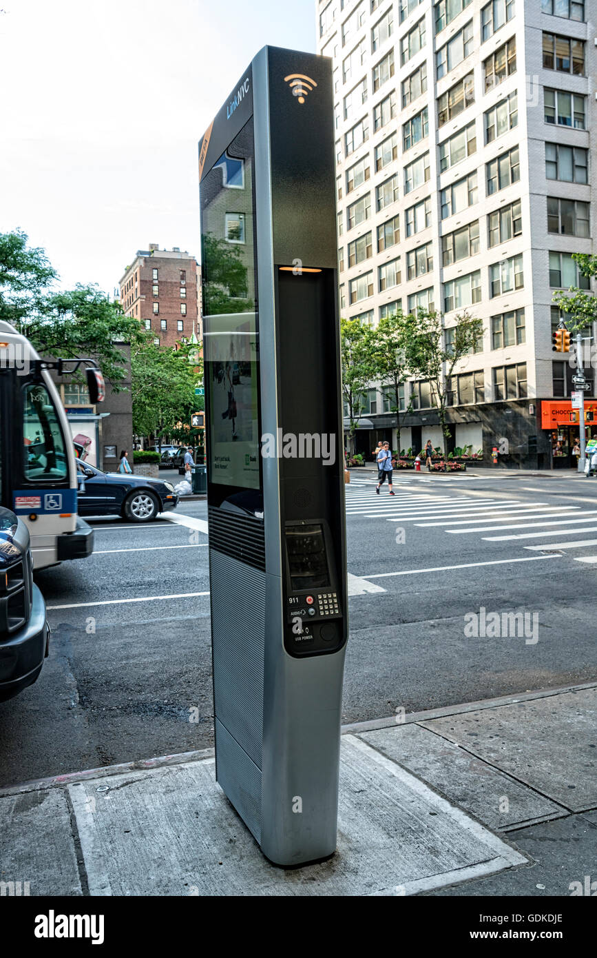 WiFi Kiosk on the Streets of the Upper East Side, New York City.  They are replacing old fashioned pay phone booths.  They offer Stock Photo