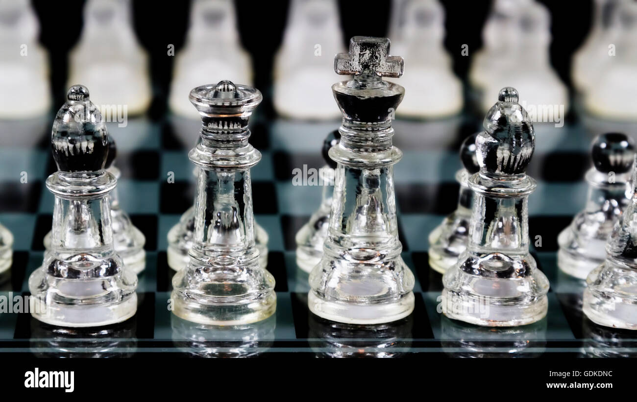 Tight Shot Of Bishops King And Queen Chess Pieces Set Up On Board In Initial Locations Stock Photo