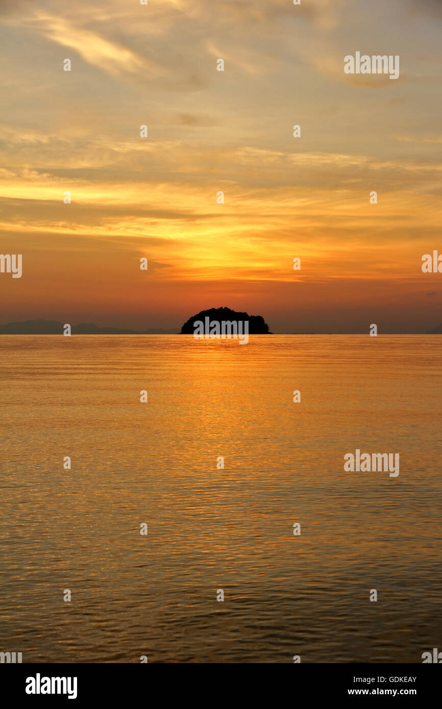 Partly cloudy in the evening sea. Stock Photo