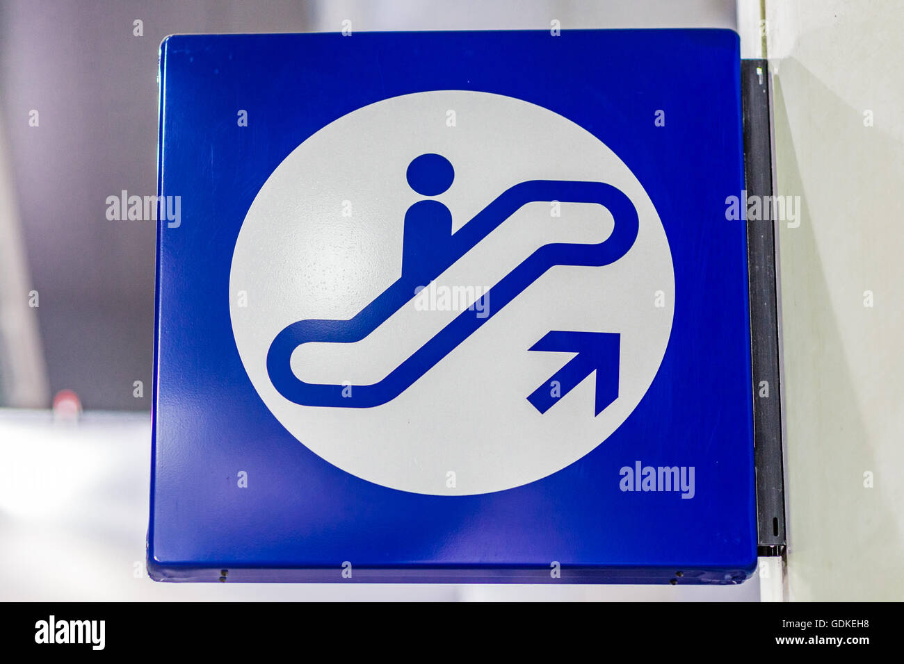 generic blue sign for escalators Stock Photo
