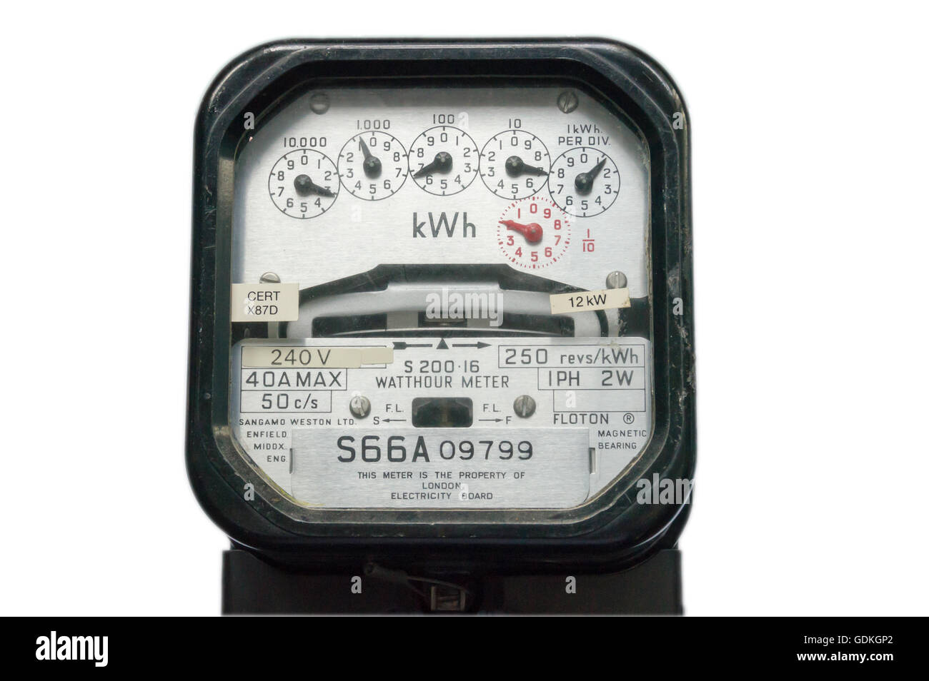 Dial type electricity meter made by Sangamo Weston, Enfield, England, reading  30671.2 kWh. Cutout with a white background Stock Photo