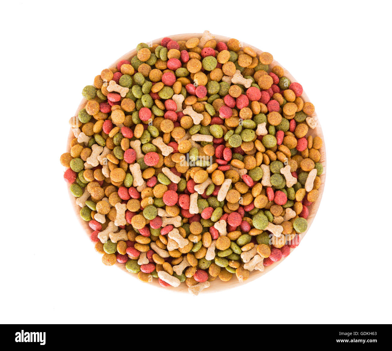 Dog food pellets on a white background Stock Photo - Alamy