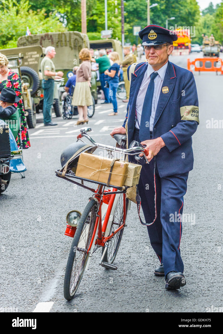 Woodhall Spa 1940s Festival - a 1940s postman with bicycle Stock Photo
