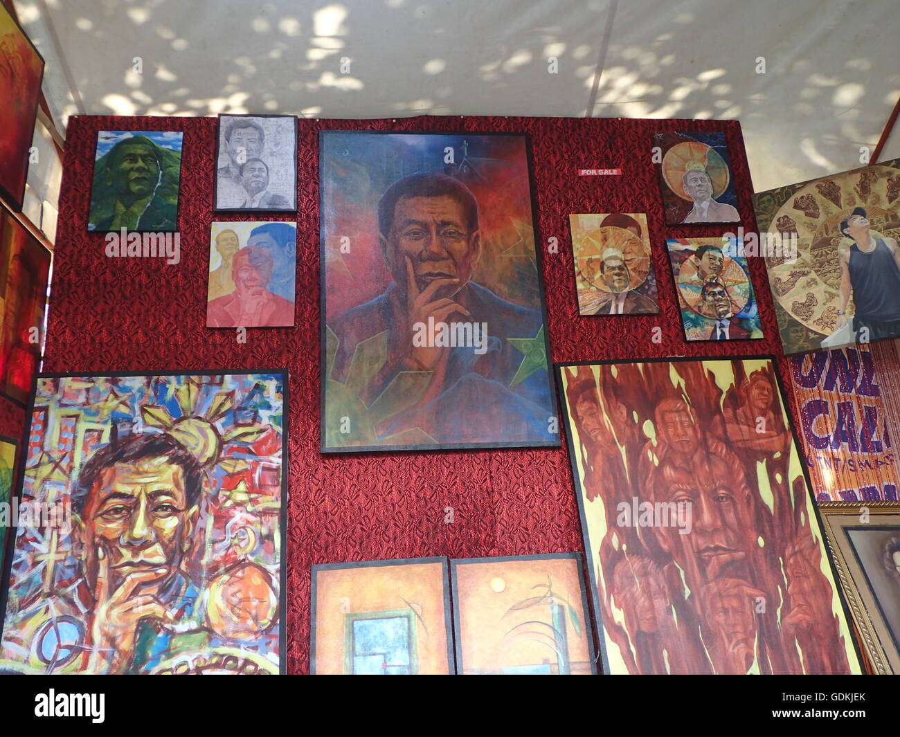 Koronadal City, Philippines. 18th July, 2016. Paintings of artistic and different faces of newly elected Philippine President Rodrigo Duterte were showcased and sold during the 50th founding anniversary of South Cotabato in Mindanao. © Sherbien Dacalanio/Pacific Press/Alamy Live News Stock Photo