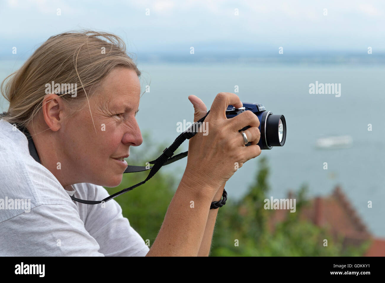 woman taking photos, Meersburg, Lake Constance, Baden-Wuerttemberg, Germany Stock Photo