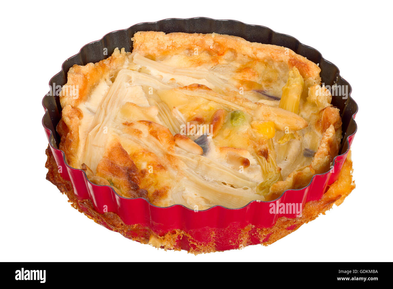 Handmade quiche in a small baking dish isolated on white background. Stock Photo