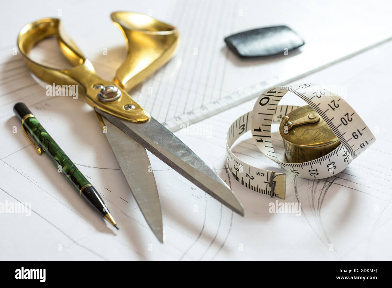 Equipment For Designing Clothes, Measuring Tape, Wooden Scale And Scissors  On Black Fabric Stock Photo, Picture and Royalty Free Image. Image 53653392.