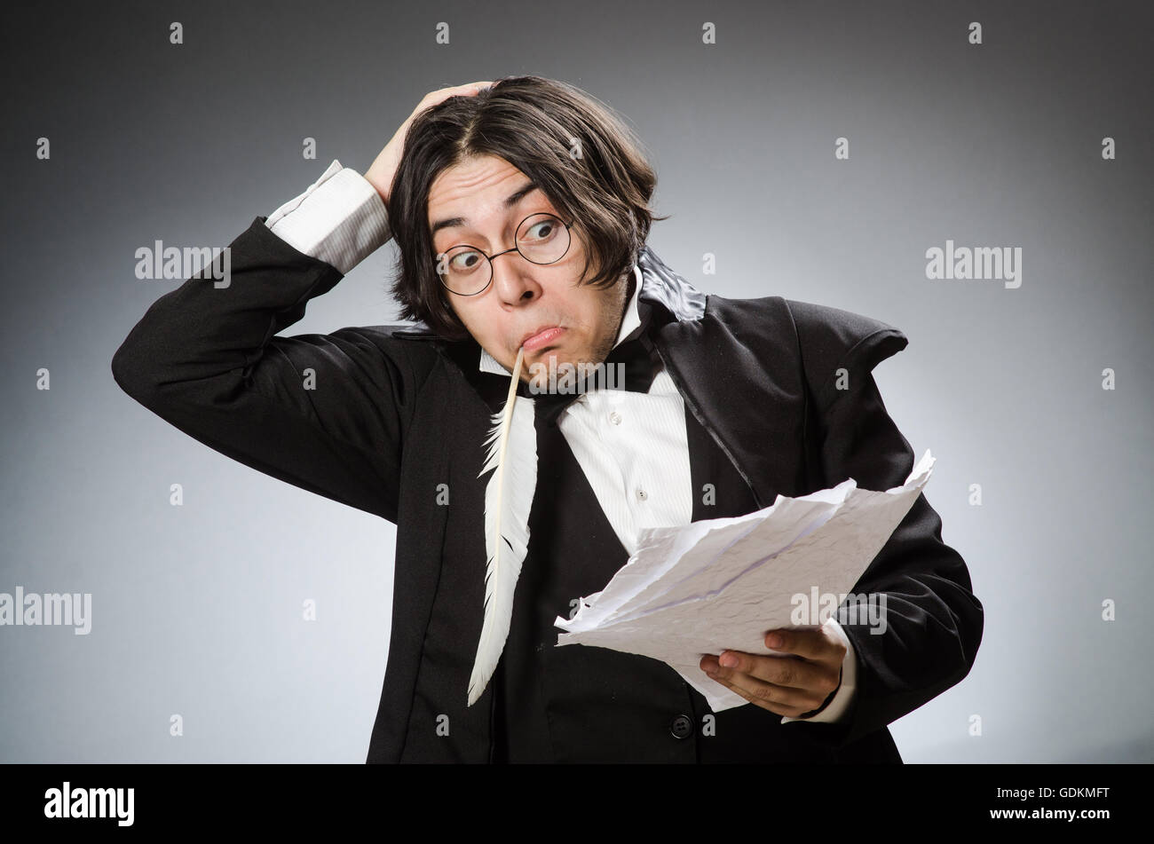 Funny writer with quill in vintage concept Stock Photo - Alamy