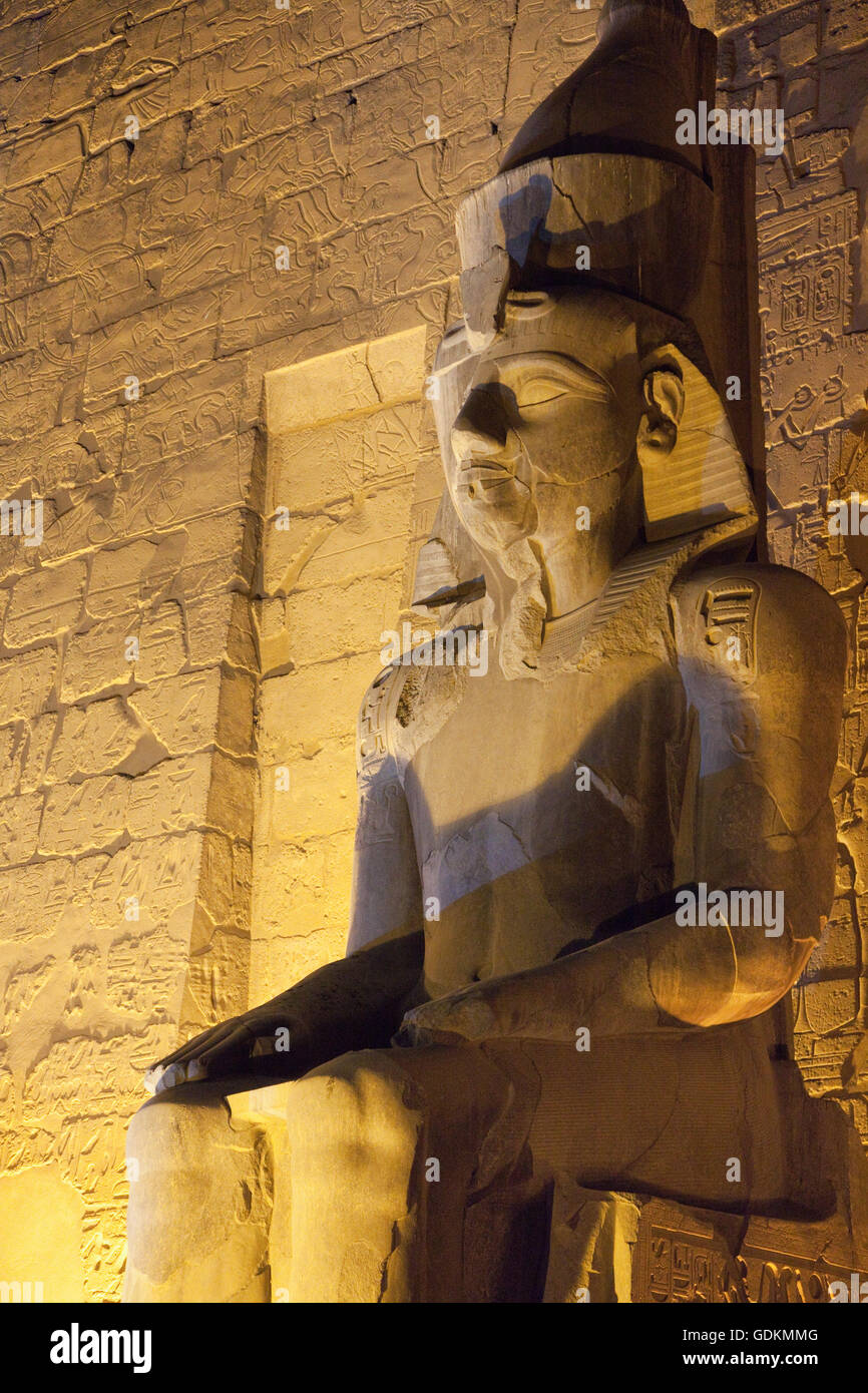 Seated Statue of Ramses II in Luxor Temple at night, Egypt Stock Photo ...
