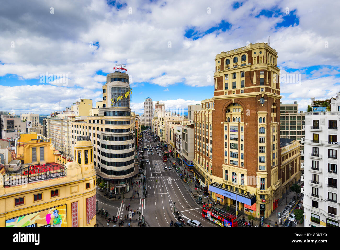 MADRID, SPAIN - OCTOBER 15, 2014: Gran Via at the Iconic Schweppes sign. The street is the main shopping district of Madrid. Stock Photo