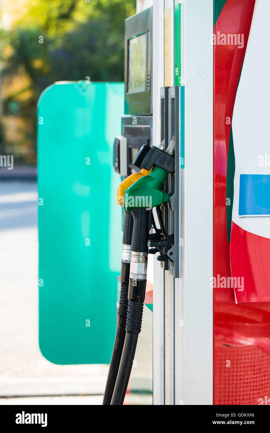 Colorful fuel oil gasoline dispenser at petrol filling station Stock
