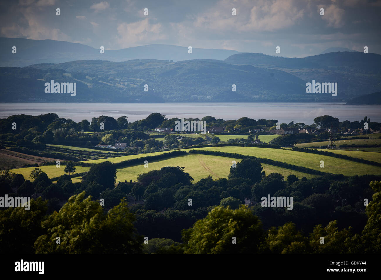 Lancashire rural view landscape looking out to the coast coastal sea irish hills Countryside fields farmland grazing long grass Stock Photo