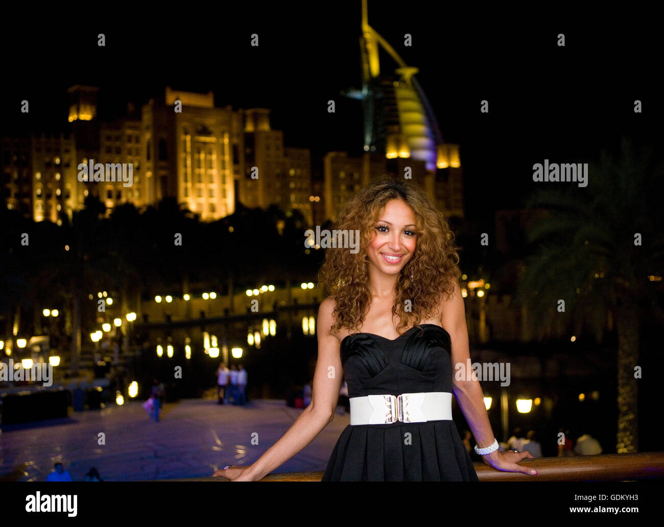 Amelle Berrabah of the Sugababes poses with the Madinat and the Burj in ...