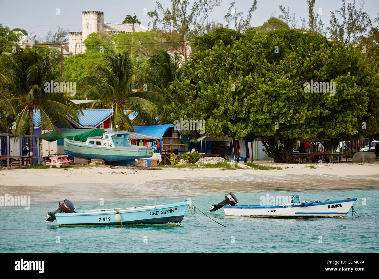 The Lesser Antilles Barbados Parish Saint Michael west indies capital The coastal town of Oistins beach boats waterfront Stock Photo
