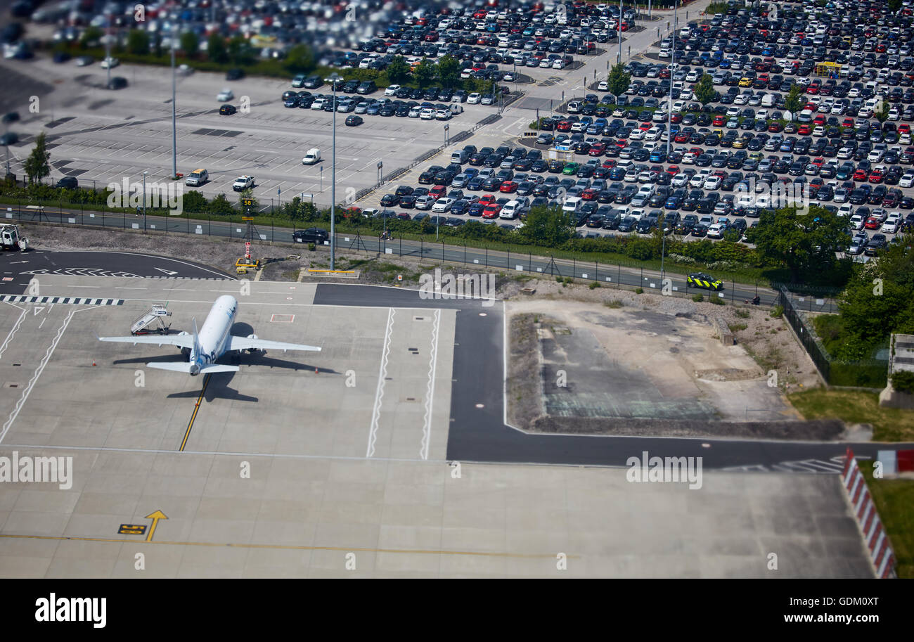 Manchester Airport   Manchester from above  shot high view tarmac and carpark stood Stock Photo